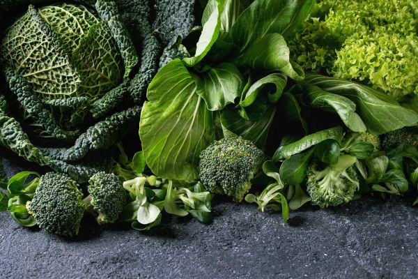 Healthy greens like kale and spinach that help fertility